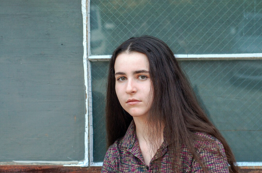 Portrait of a young woman with dark hair